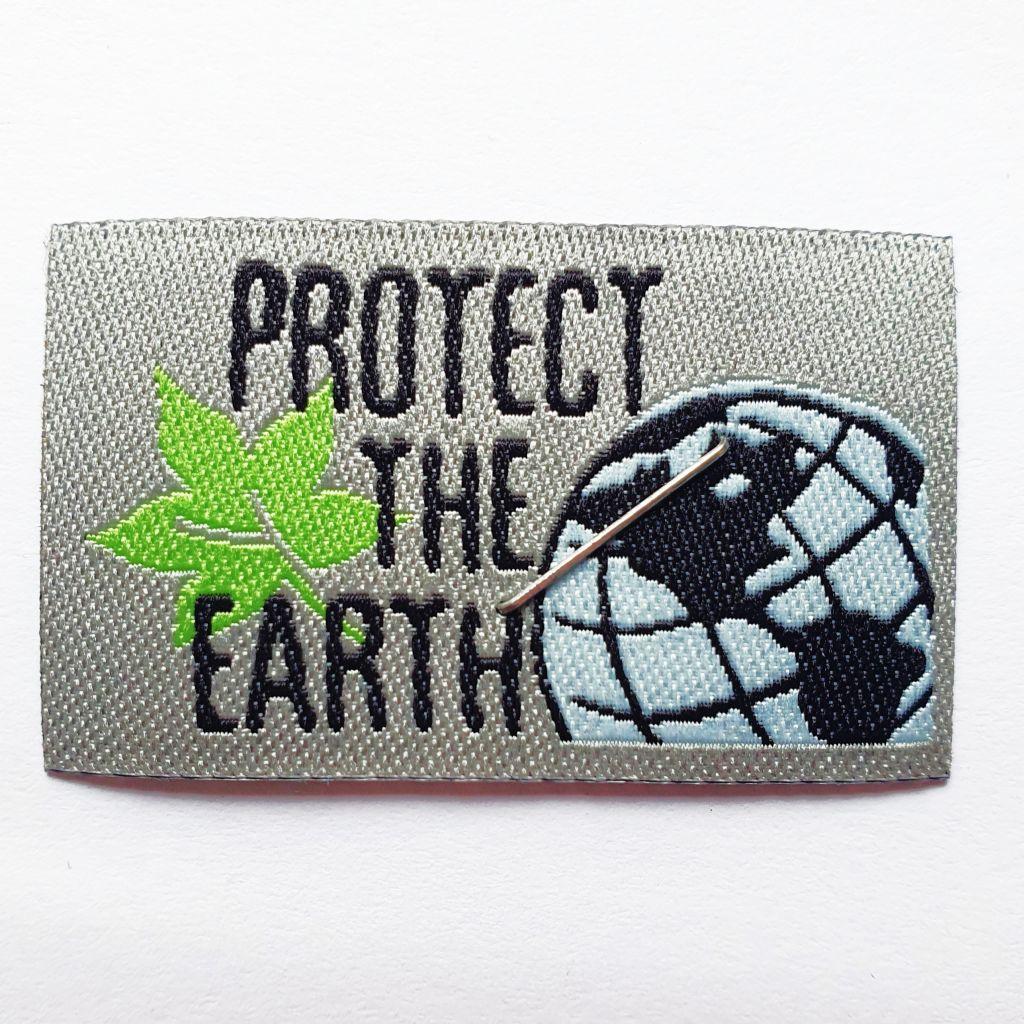 Bügelbild Applikation Webetikett "Protect the Earth" gelb