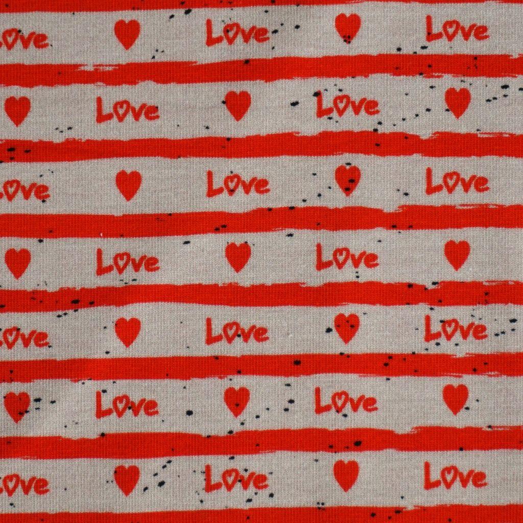 Baumwolljersey Text "Love" Herzen rot ecru