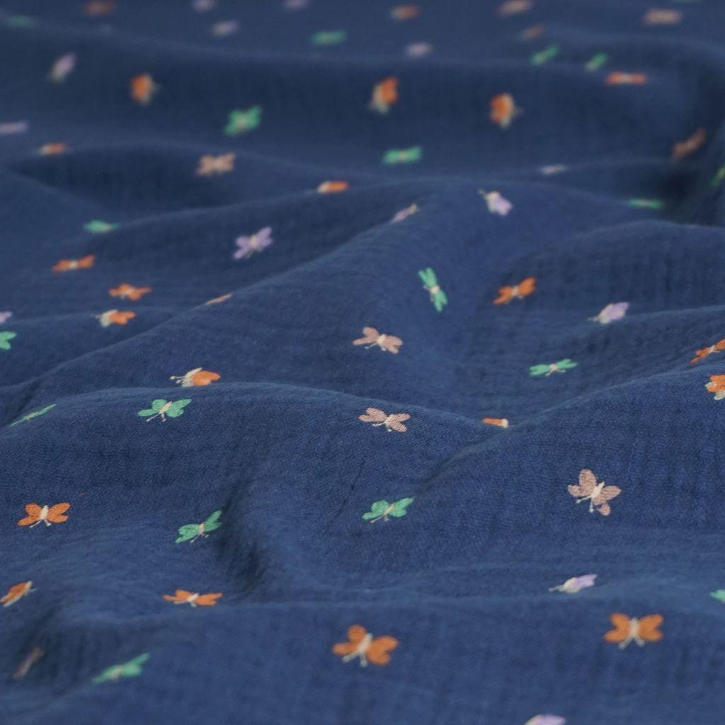 Musselin Double Gauze kleine bunte Schmetterlinge auf blau